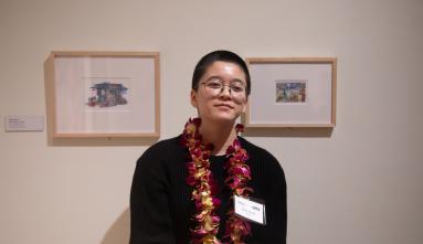 rain szeto in front of her art
